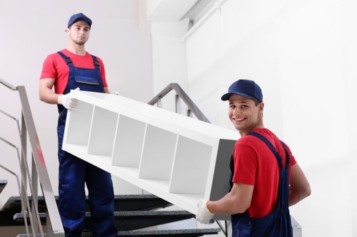 Local moving team handling boxes and furniture near South Ruislip