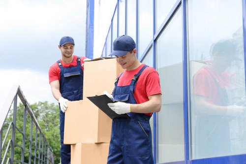 Packed boxes and furniture for a local removals service