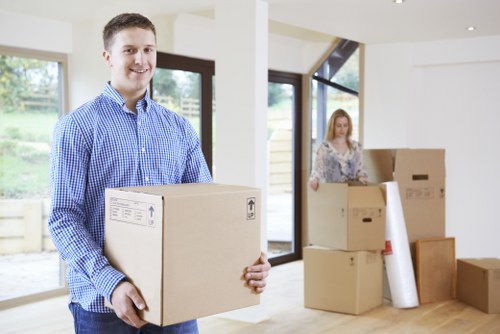 Moving team handling furniture during a van service