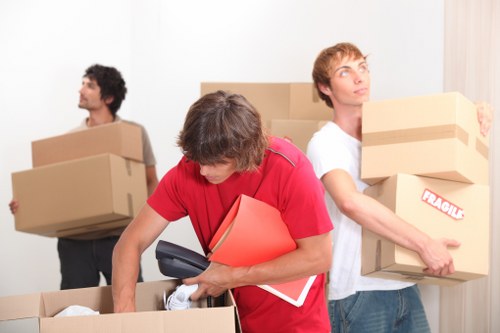 Office relocation planning in South Ruislip with moving boxes and business equipment